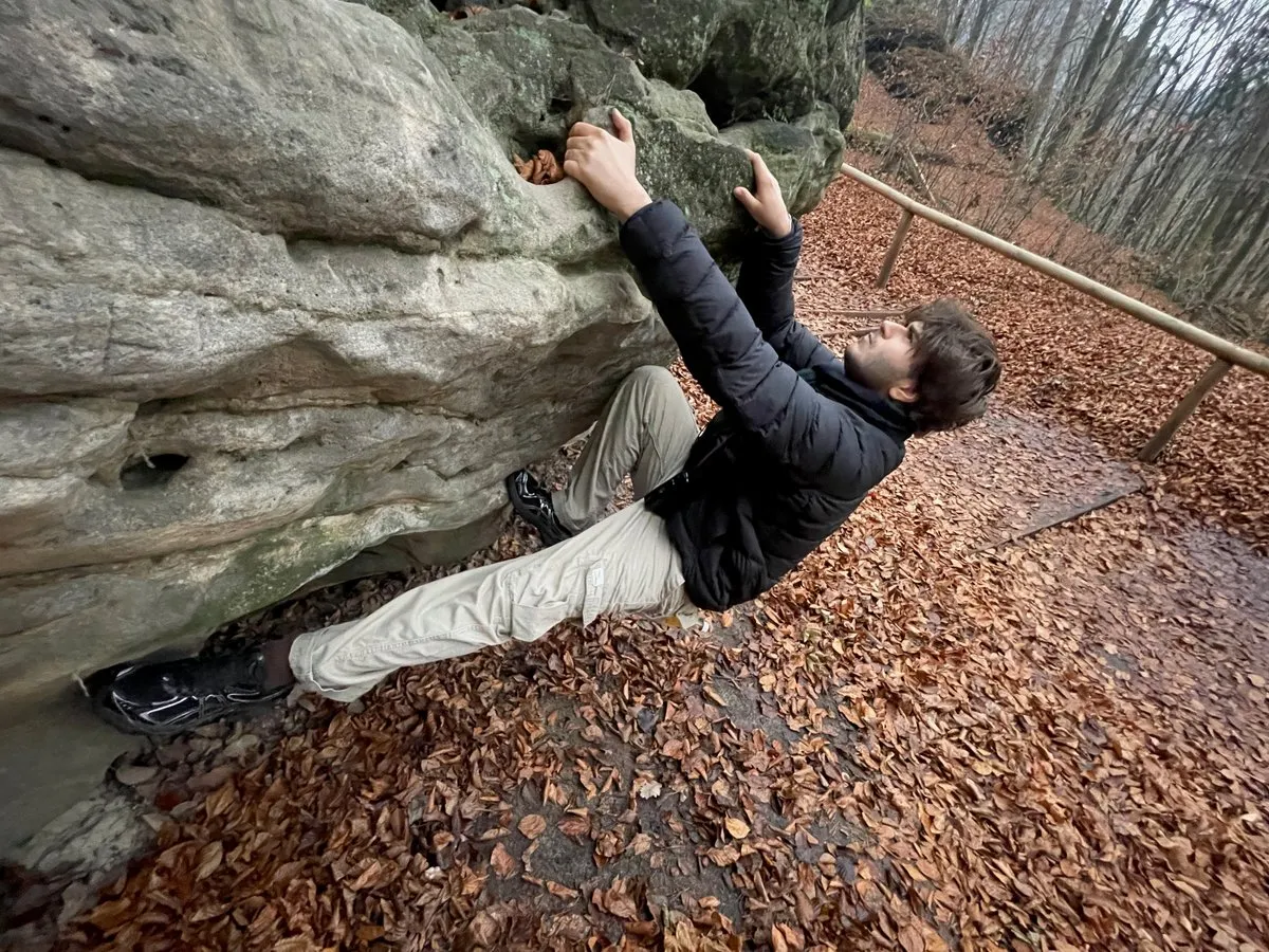 Maryan posing on a rock during a trip to Dresden
